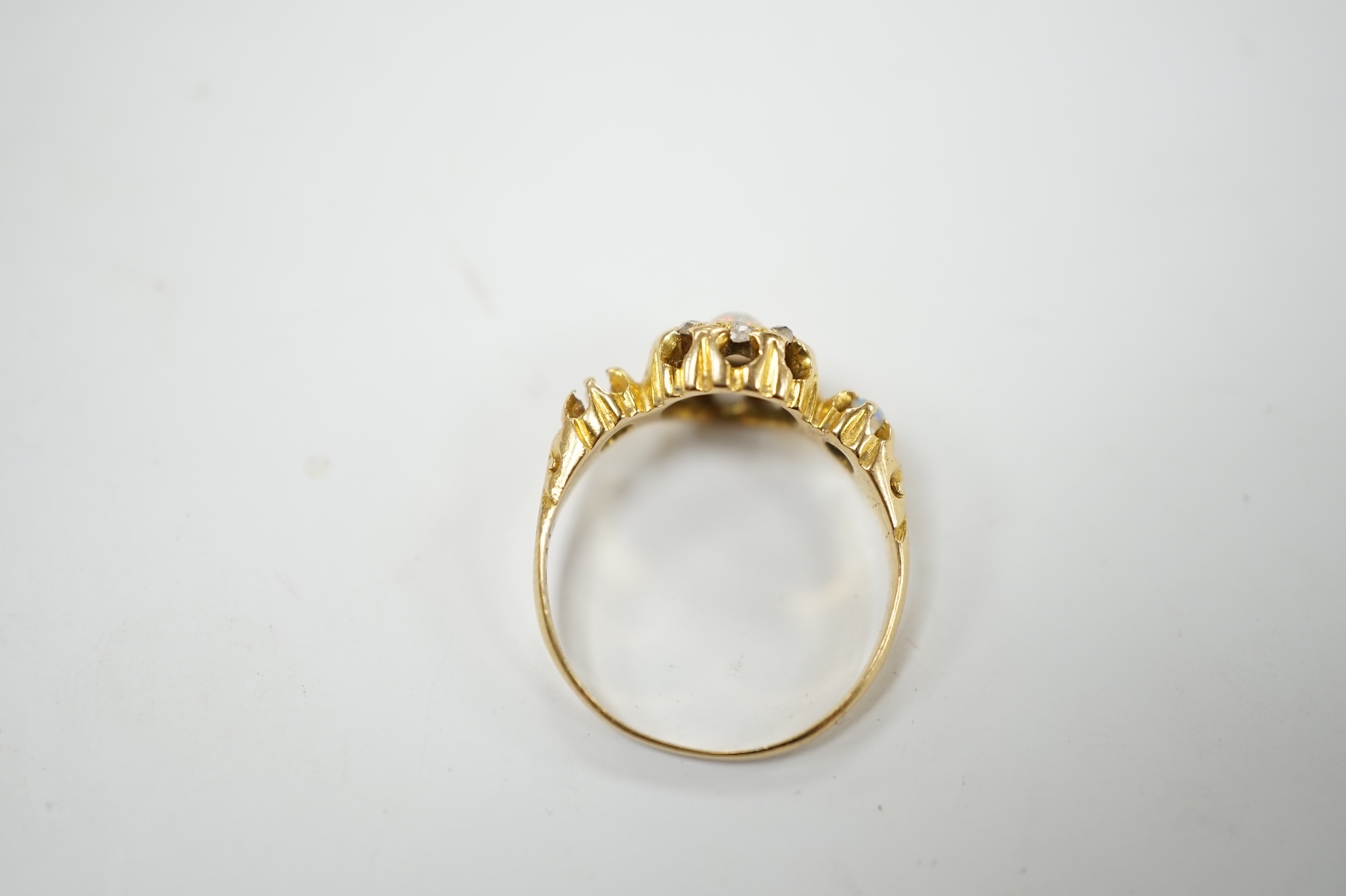 A late Victorian 18ct gold, white opal and diamond cluster set ring, size J, gross weight 2.3 grams. Condition - poor